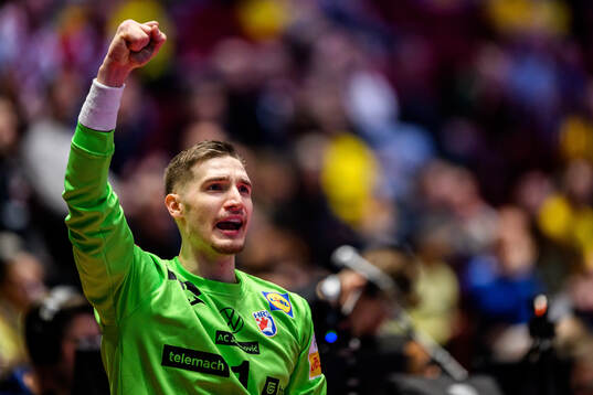Goalkeeper Dominik Kuzmanovic of Croatia celebrates