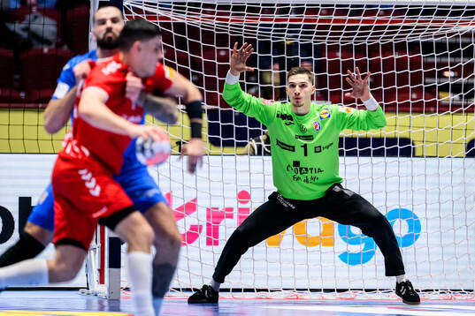 Goalkeeper Dominik Kuzmanovic of Croatia