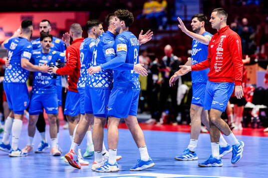 Zvonimir Srna and Luka Lovre Klarica of Croatia celebrate