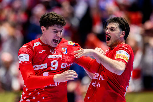 Luka Lovre Klarica and Filip Glavas of Croatia celebrate