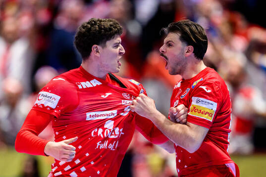 Luka Lovre Klarica and Filip Glavas of Croatia celebrate