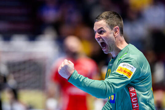 Goalkeeper Andreas Palicka of Sweden celebrates