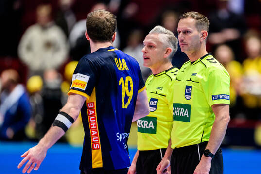 Felix Claar of Sweden and referee Robert Schulze and Tobias