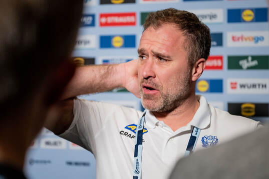 Head coach Michael Apelgren of Sweden is being interviewed