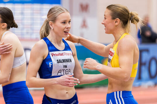 Heidi Salminen of Finland celebrates
