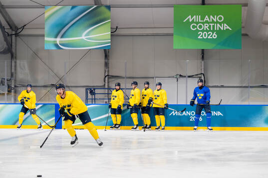 Players of Sweden at an ice hockey practice session