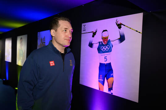 Head coach Sam Hallam at a press conference with the