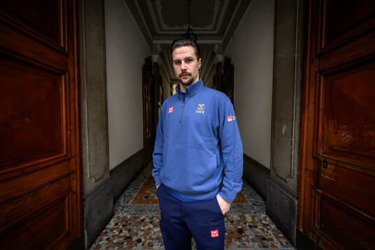Erik Karlsson poses for a portrait at a press conference