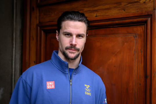 Erik Karlsson poses for a portrait at a press conference