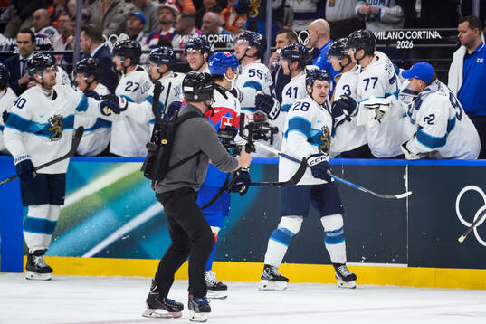 Eeli Tolvanen of Finland celebrate