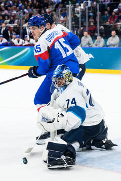 Dalibor Dvorsky of Slovakia and Juuse Saros of Finland in