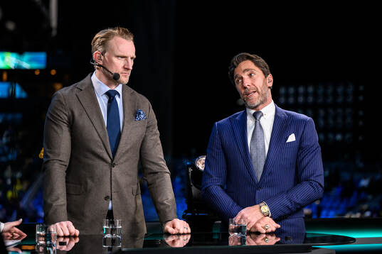 Staffan Kronwall and Henrik Lundqvist of Swedish