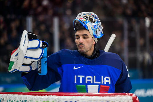 Davide Fadani of Italy in the men's ice hockey game between