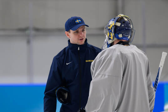 Goalkeeper coach Anthon Hansson of Sweden at an ice hockey