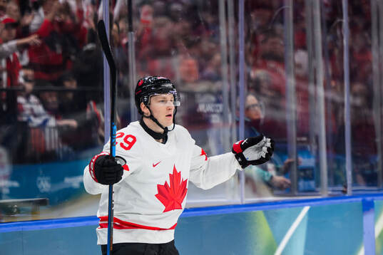 Nathan MacKinnon of Canada reacts