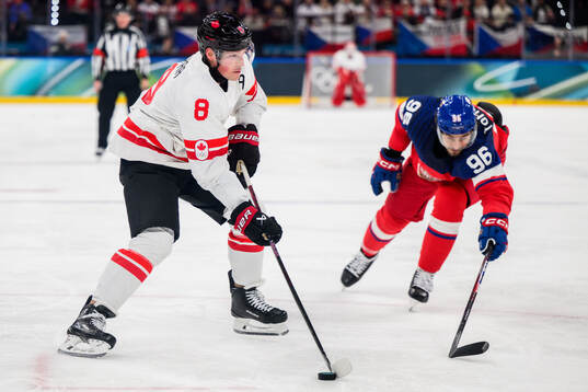 Cale Makar of Canada and David Tomasek of Czech Replublic