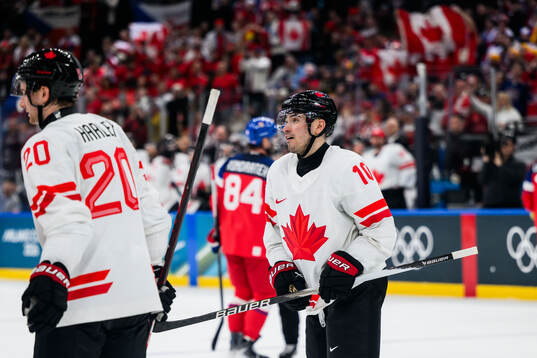 Nick Suzuki of Canada celebrates the 0-5 goal in the men's