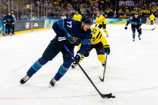 Niko Mikkola of Finland in the men's ice hockey game