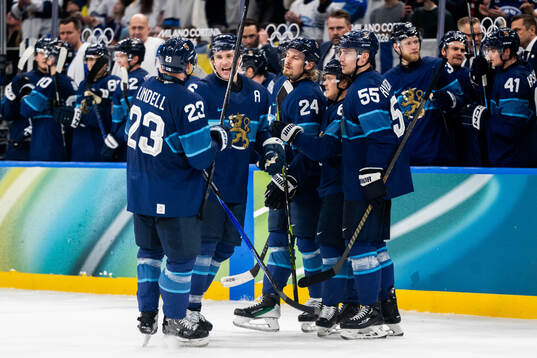 Mikko Rantanen of Finland celebrates with teammates