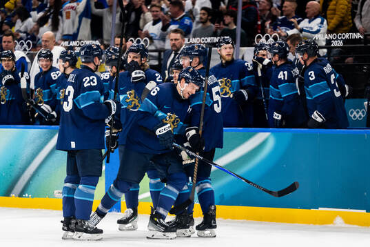 Mikko Rantanen of Finland celebrates with teammates