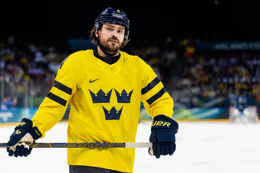 Rasmus Andersson of Sweden looks dejected in the men's ice