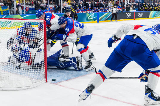 Goaltender Samuel Hlavaj, Erik Cernak and Adam Liska of