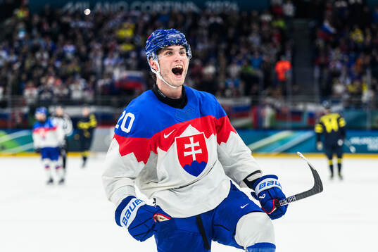 Juraj Slafkovsky of Slovakia celebrate