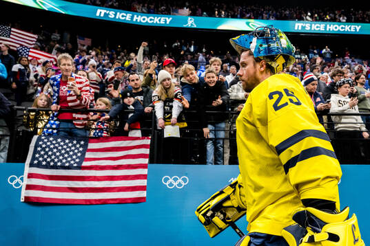 Goaltender Jacob Markström of Sweden looks dejected after