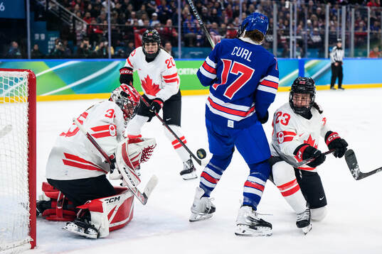 goaltender Ann-Renee Desbiens and Erin Ambrose of Canada
