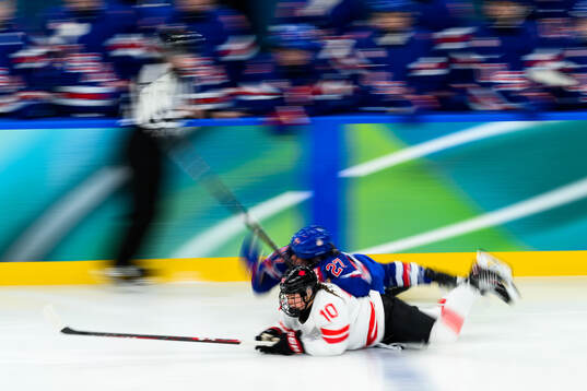 Sarah Fillier of Canada and Taylor Heise of USA in the