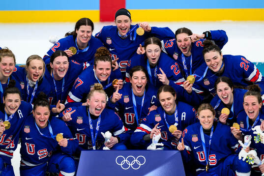 Hilary Knight of USA with teammates celebrate with their