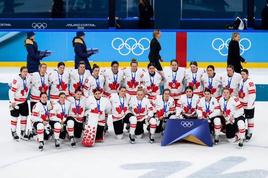 Team Canada with their silver medals at the medal ceremony