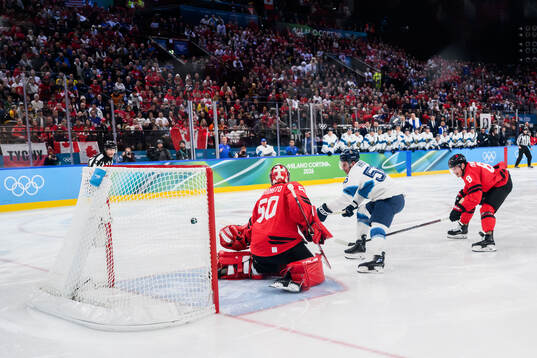 Erik Haula of Finland scores the 0-2 goal against