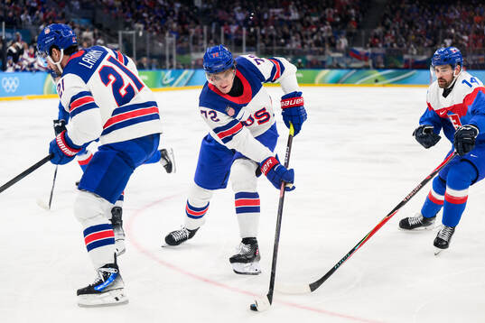 Tage Thompson of USA and Peter Ceresnak of Slovakia in the