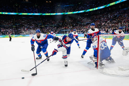 Martin Marincin of Slovakia and Brady Tkachuk of USA in the