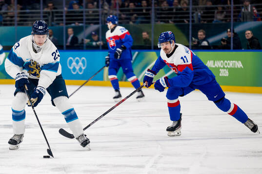 Esa Lindell of Finland and Milos Kelemen of Slovakia in the