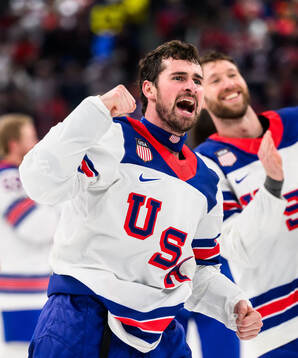 Charlie McAvoy of USA celebrates