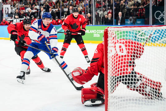 Matt Boldy of USA scores the 0-1 goal against goaltender