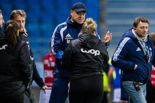 Head coach Kent Rudning of Molde and head coach Laura