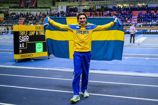 Armand Duplantis of Sweden celebrates winning in men's pole