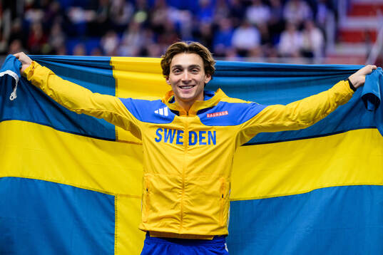 Armand Duplantis of Sweden celebrates winning in men's pole