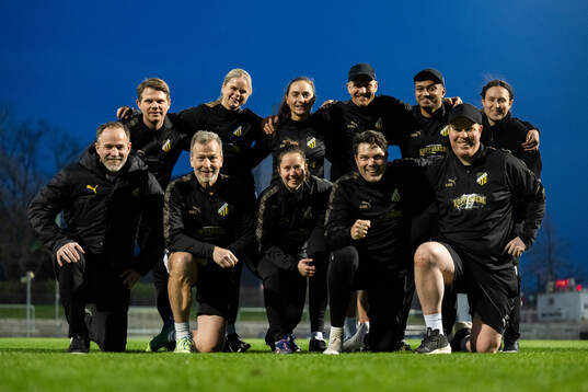 Staff pose for a picture