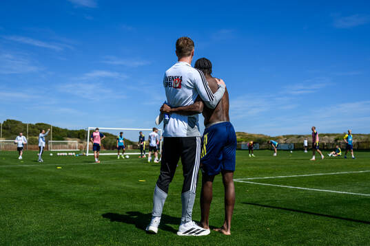 Head coach Graham Potter and Anthony Elanga of the Swedish