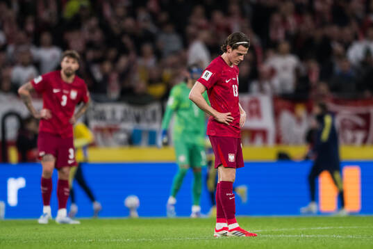 Jakub Kaminski of Poland looks dejected