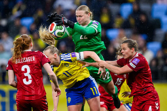 Stina Blackstenius of Sweden and goalkeeper Freja Thisgaard