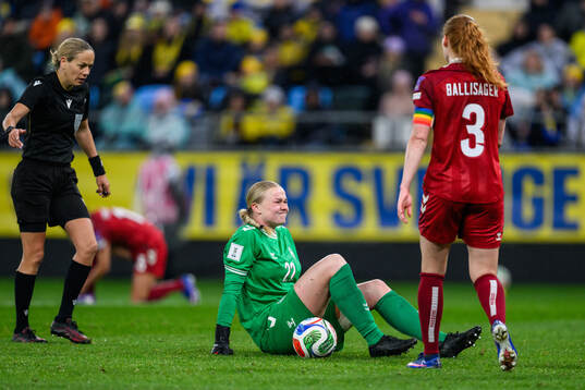 goalkeeper Freja Thisgaard of Denmark in pain