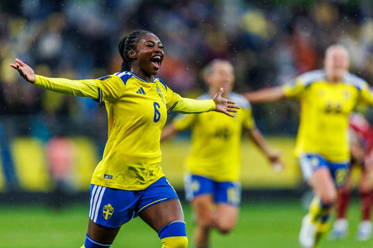 Monica Jusu Bah of Sweden celebrates