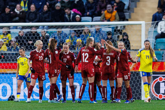 Pernille Harder of Denmark celebrates