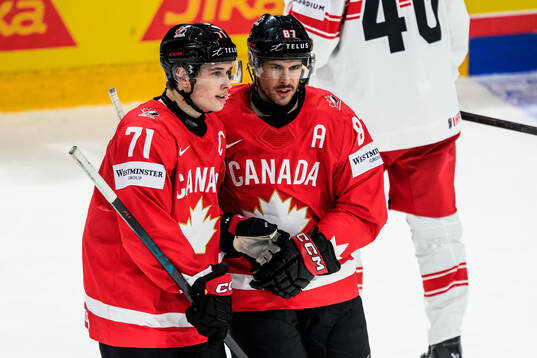 Macklin Celebrini and Sidney Crosby of Canada