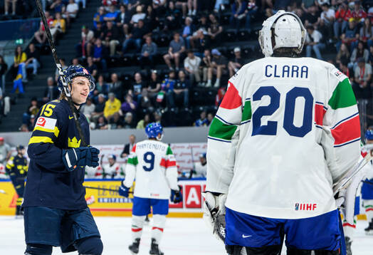 Jack Berglund of Sweden and goaltender Damian Clara of Italy